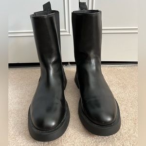 Black slip on women’s boots from Zara. Size 40.  Fits like size 10. Never worn!